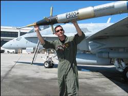 Tactical Combat Training System pod on F/A-18 Hornet.